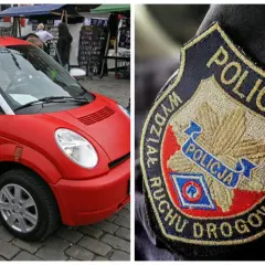Czerwony samochód bez prawa jazdy smart, obok naszywka policji drogowej.