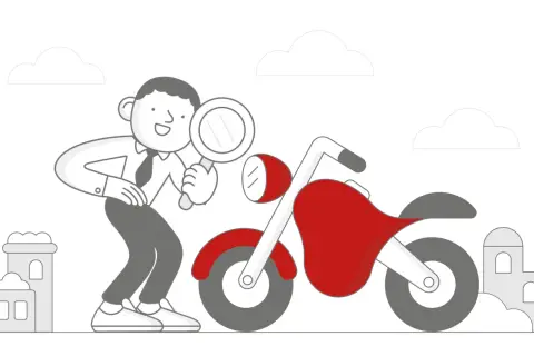 Człowiek z lupą bada czerwony motocykl, zastanawiając się, ile kosztuje przegląd motocykla.