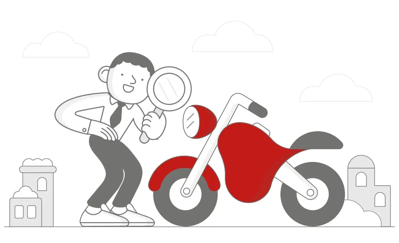 Człowiek z lupą bada czerwony motocykl, zastanawiając się, ile kosztuje przegląd motocykla.